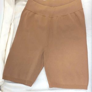 Tan Aritzia Wilfred knit biker shorts, size medium, new without tags.